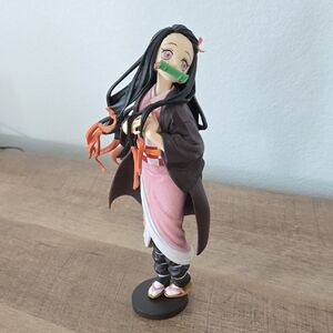 Anime Figure with Pink and Brown Outfit